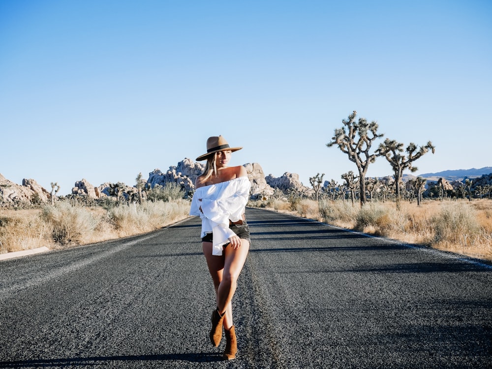 woman standing on road