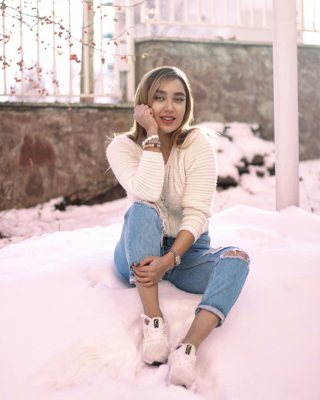 woman sitting on snow