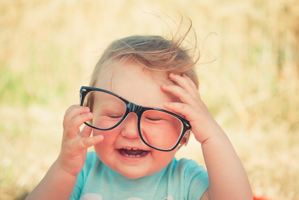 toddler wearing eyeglasses