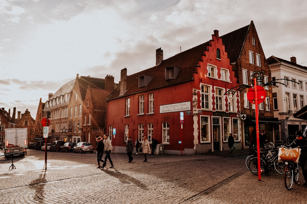 people near buildings during daytime