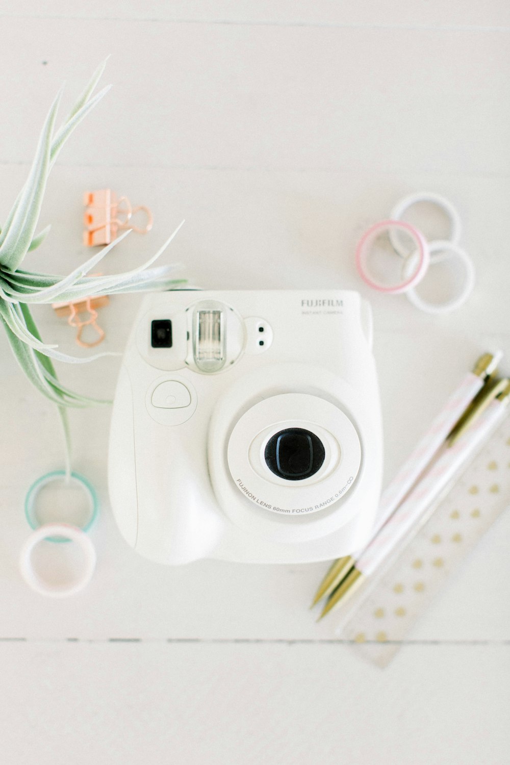 white Fujifilm Instant camera