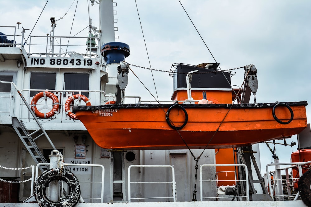 orange and black boat