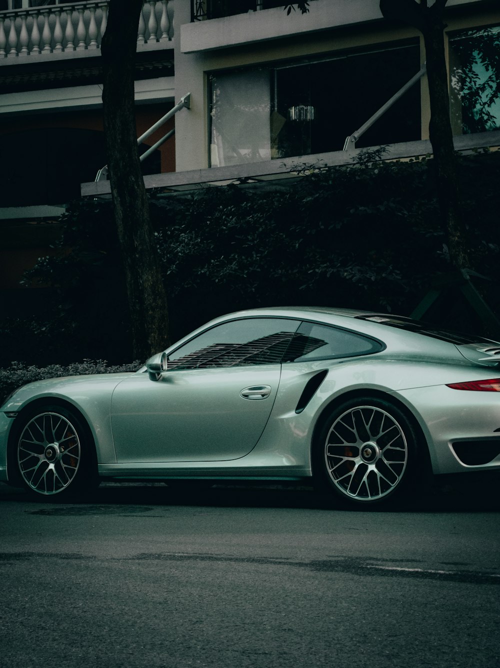 silver car parked on road