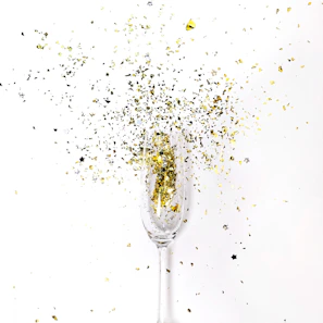 A jackpot win screen with coins and confetti exploding on the display.