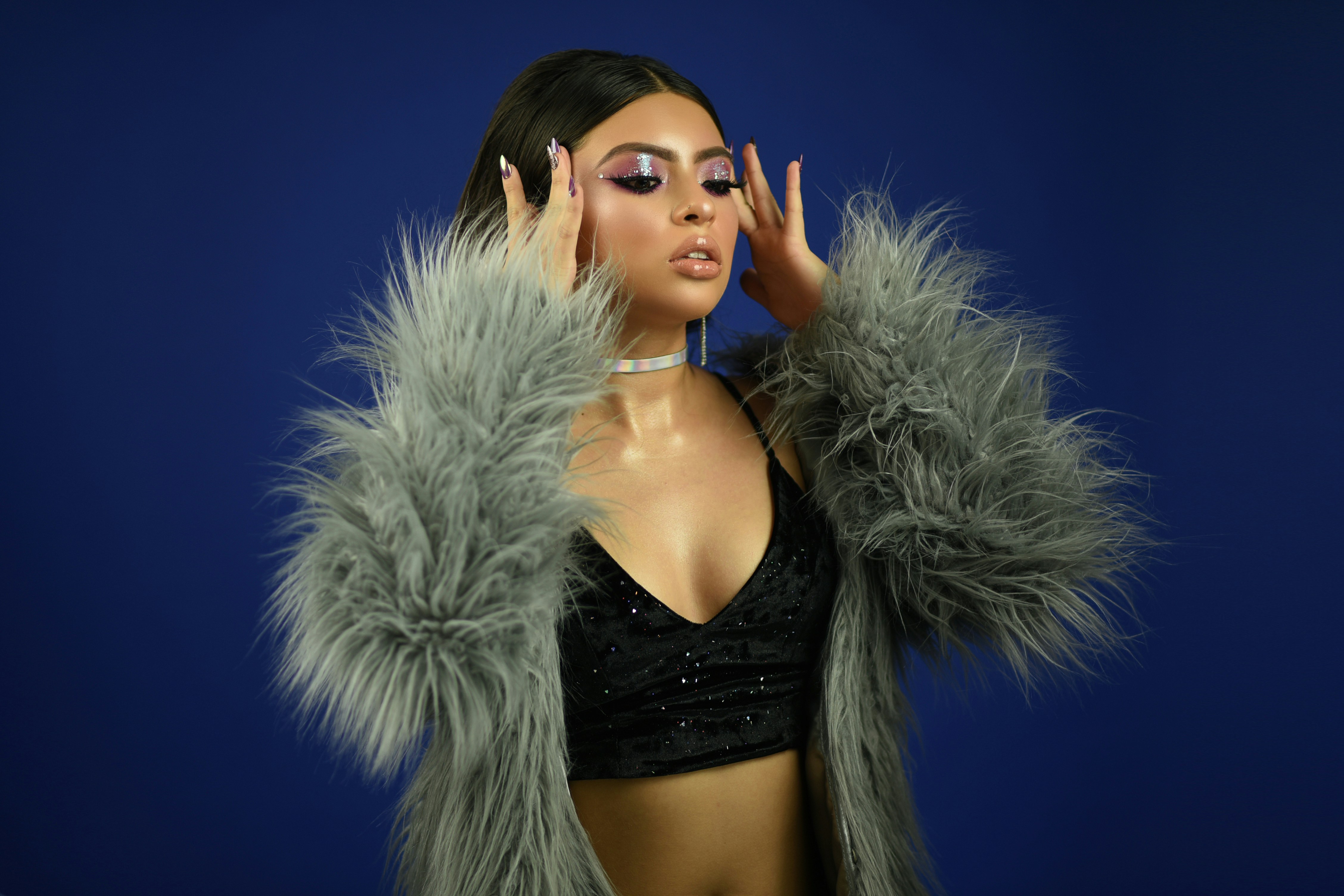 woman wearing grey fur coat