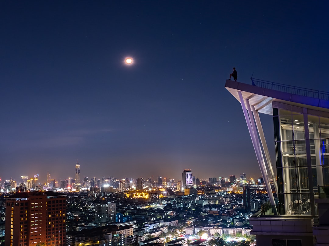 city with high rise buildings during night time