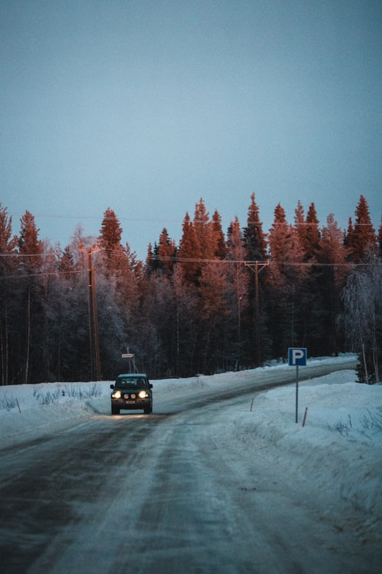 photography of traveling vehicle during daytime in Lapland Finland