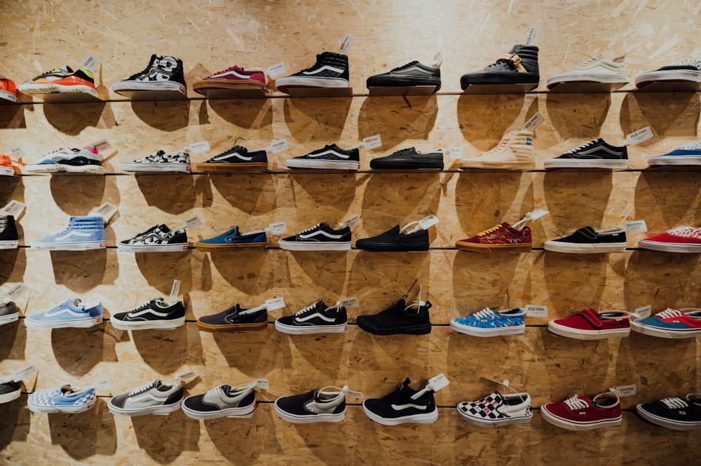 assorted Vans shoes display