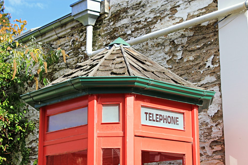 red, green, and brown Telephone booth