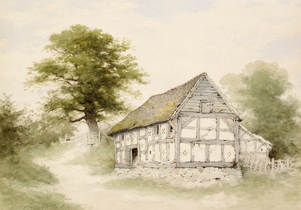 A rustic, half-timbered cottage set in a tranquil rural landscape. The cottage features exposed wooden beams and a sloped, shingled roof. Nearby, a large, leafy tree offers shade, and a dirt path winds past the front of the house. The surroundings are lush with greenery, indicative of a peaceful countryside setting.