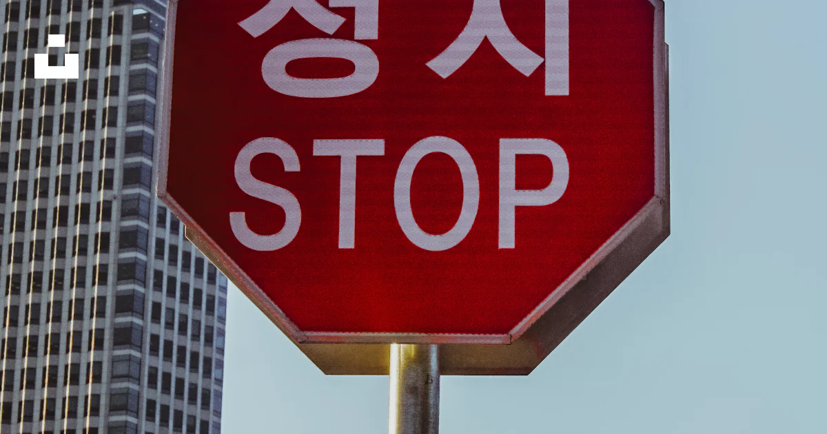 Stop Sign For Building Stop traffic signage near building photo – Free Brown Image on Unsplash