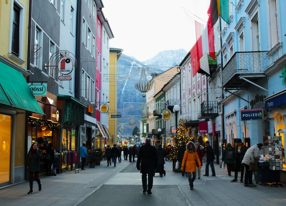 people near buildings during day