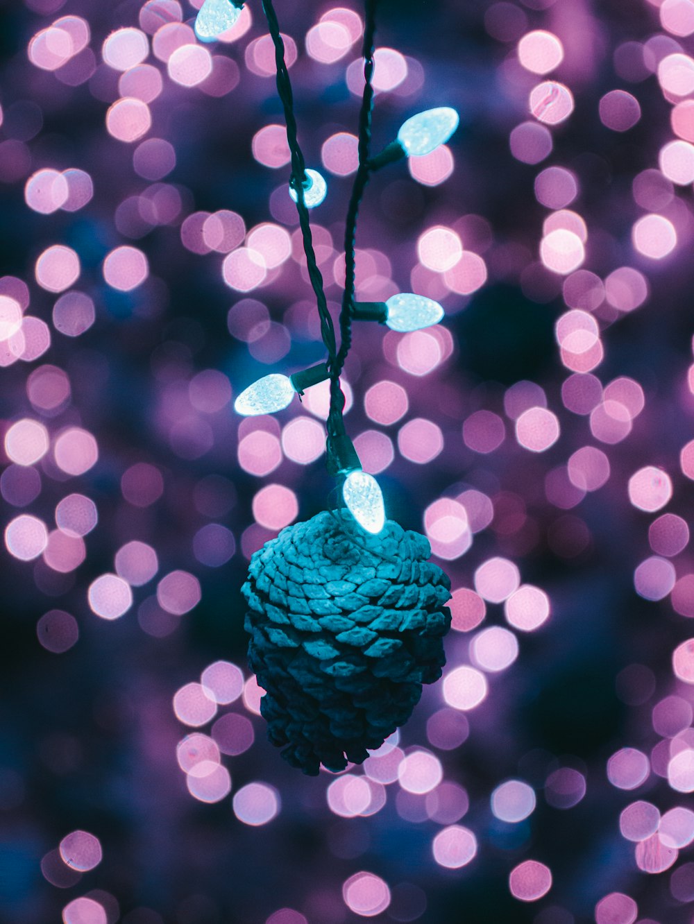 shallow focus photo of blue hanging decor