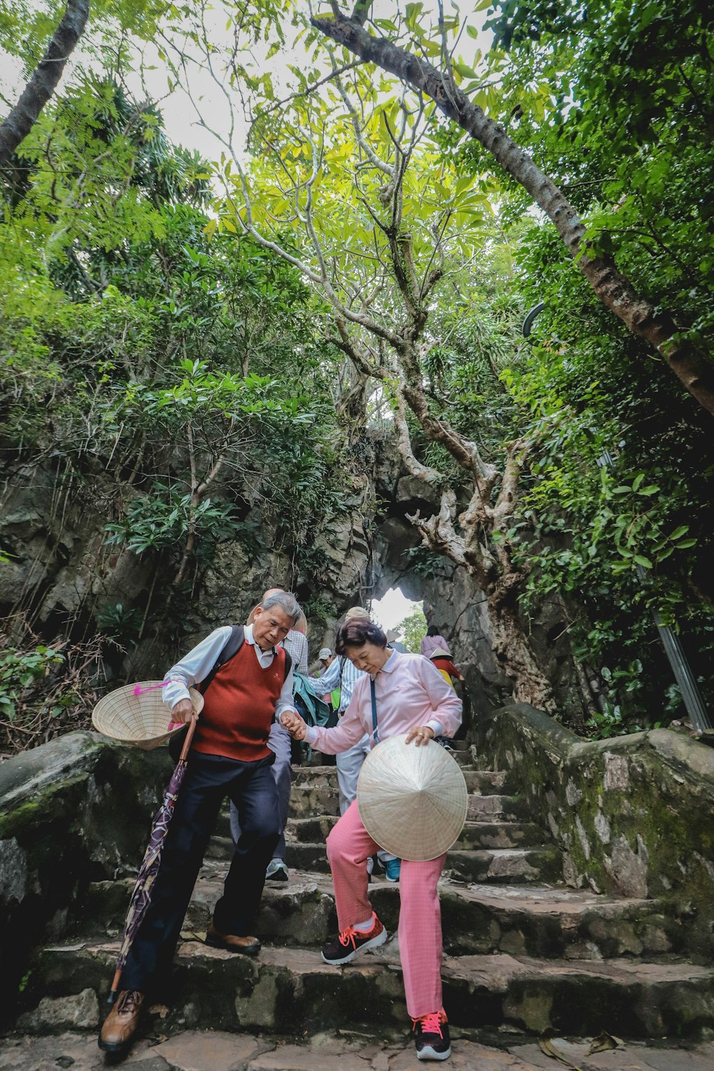 people walking down a staircase