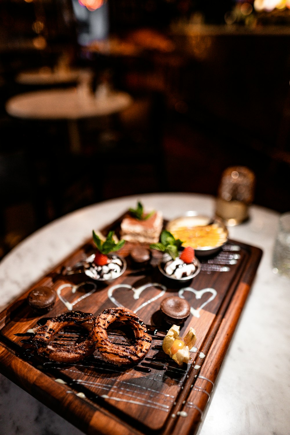 chopping board filled with desserts