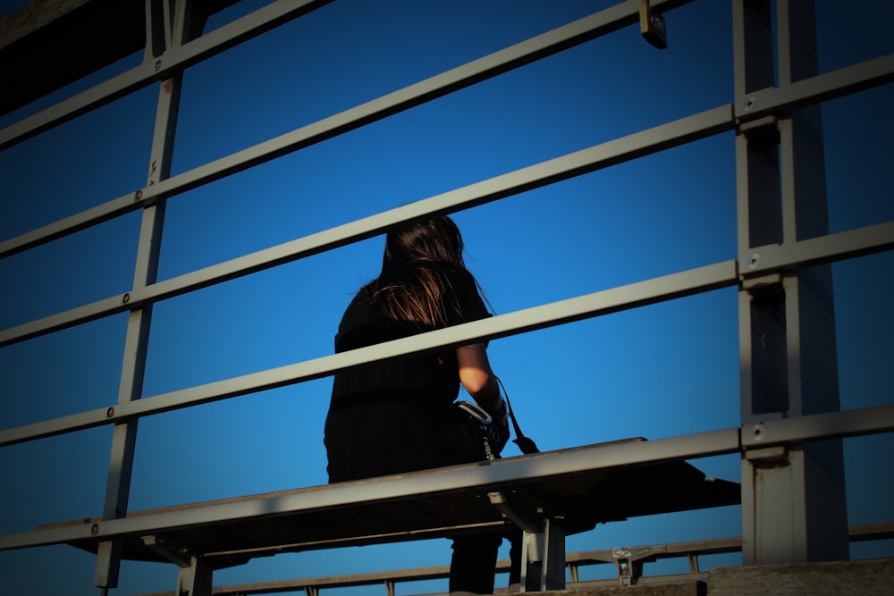 woman sitting on the bench