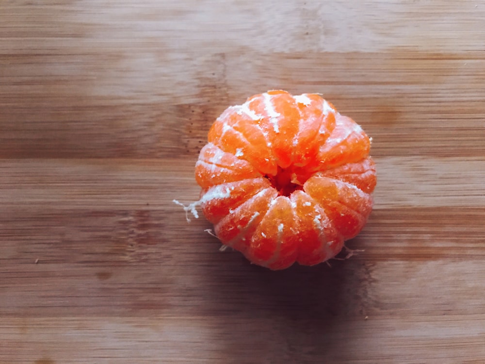 selective focus photography of peeled orange fruit