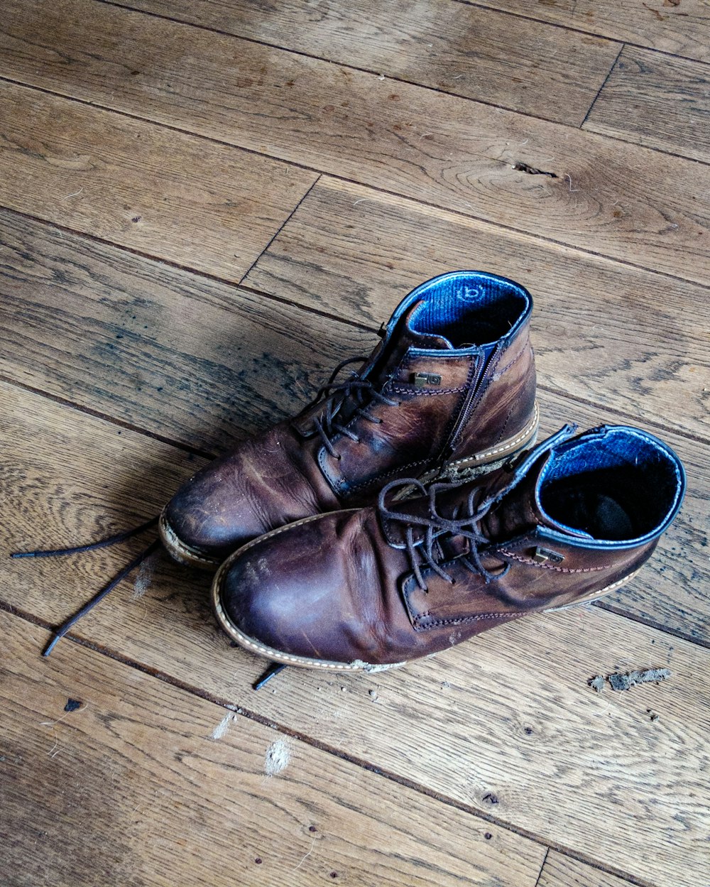blue-and-brown leather boots