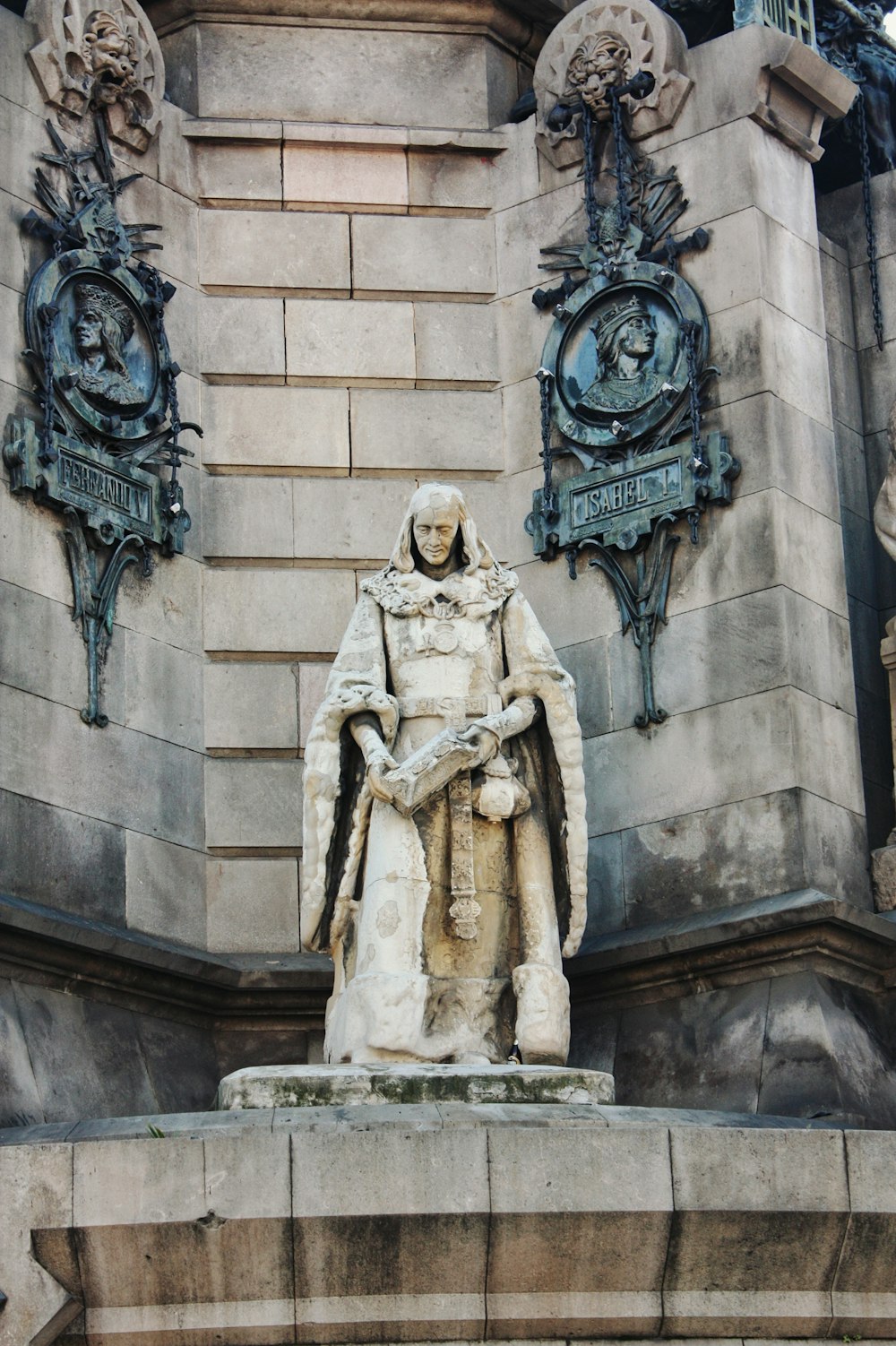 standing man statue during day