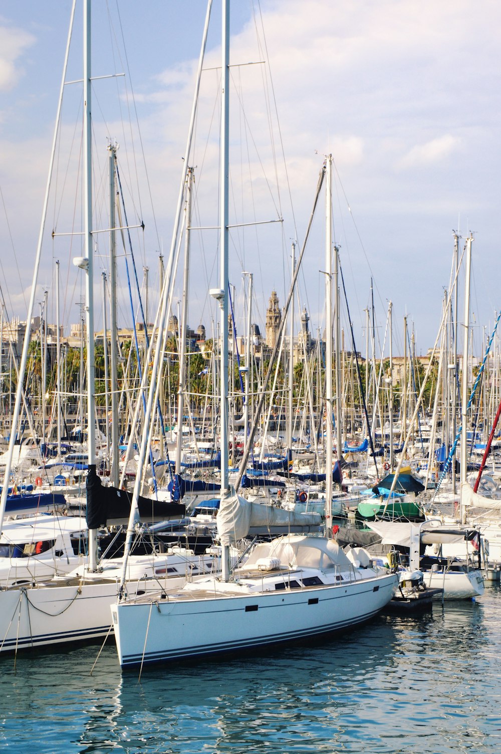 docked boats at the pier during day