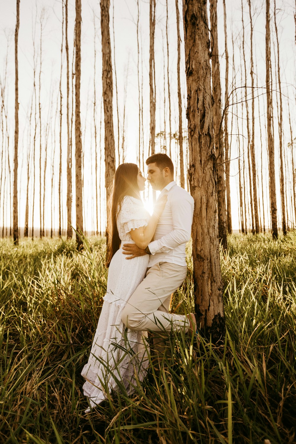 man and woman under trees