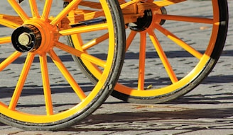 yellow and black carriage on gray floor