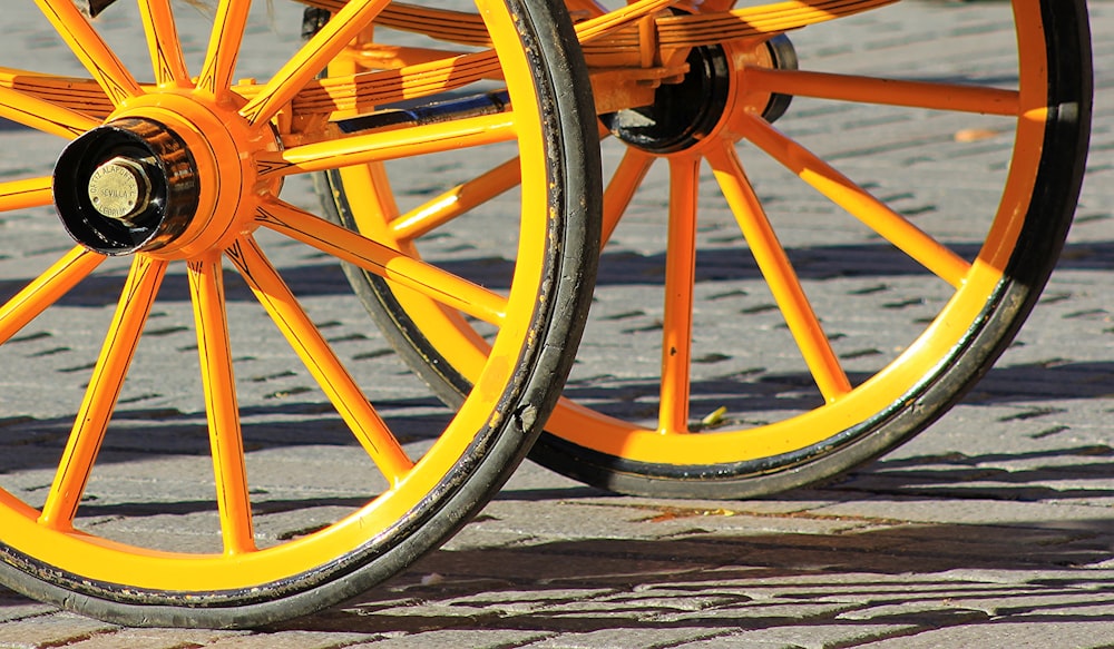 yellow and black carriage on gray floor