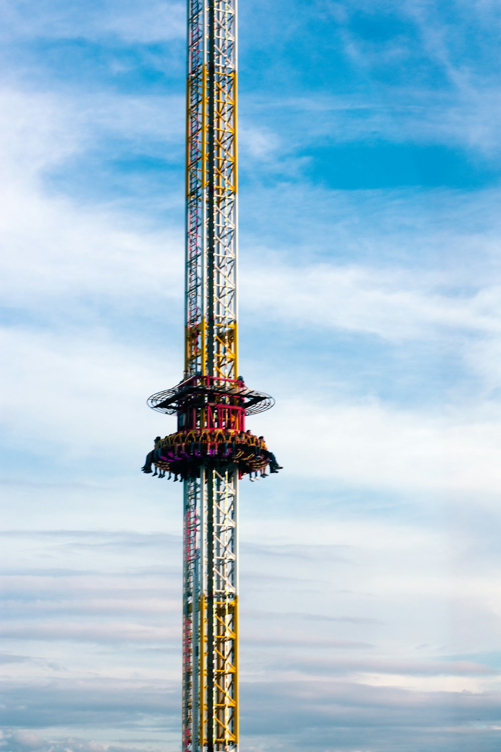 people riding retractable joyride