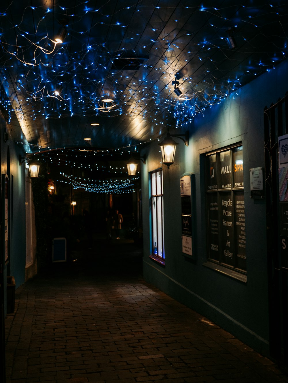 empty hallway with string lights