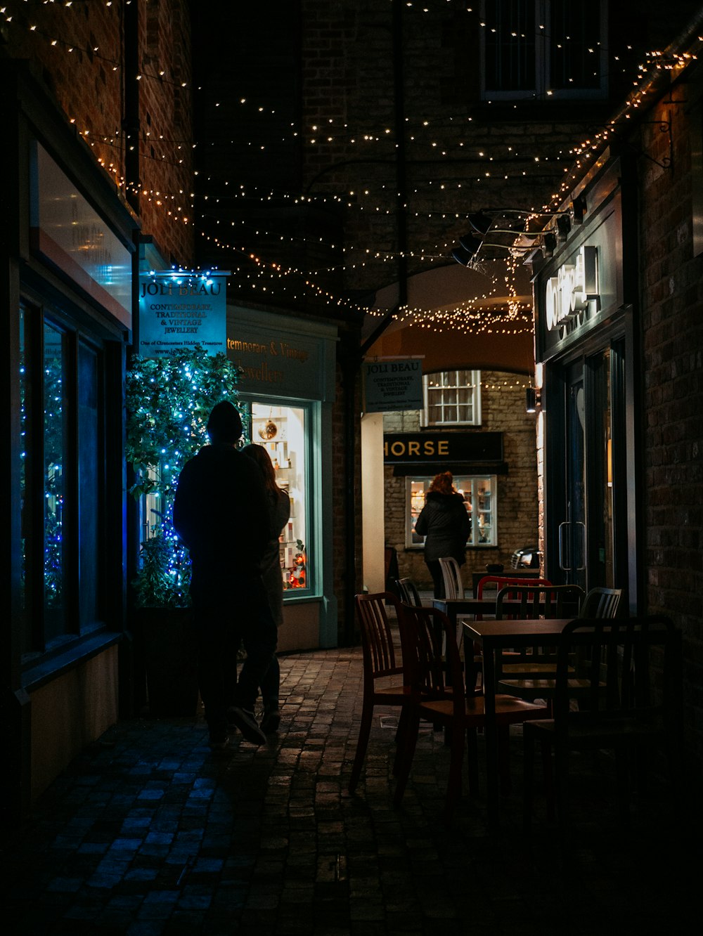 person standing beside window