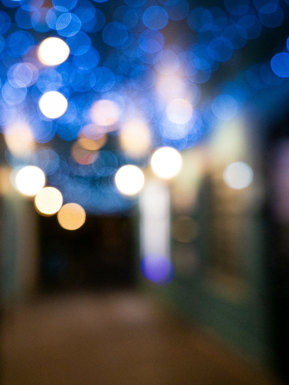 a blurry photo of a hallway with lights
