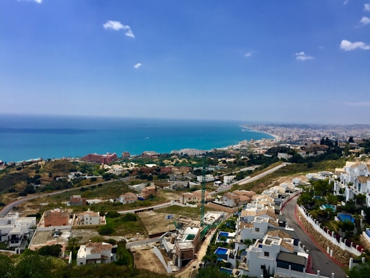 aerial photography of buildings near body of water