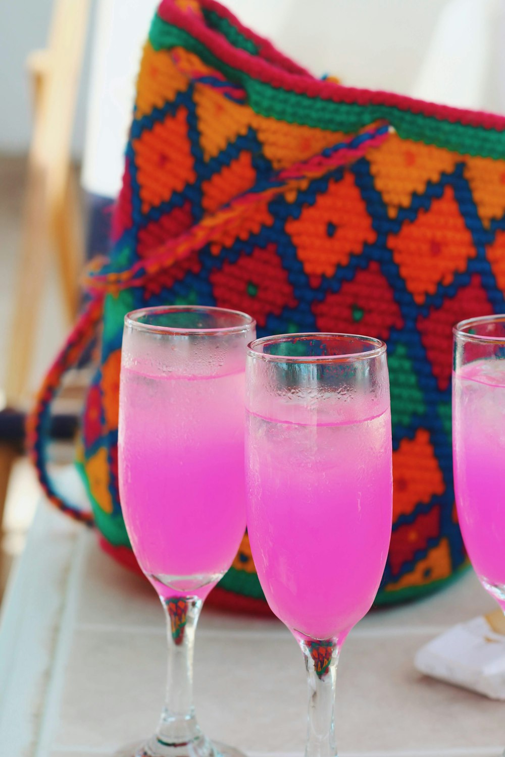 pink liquid filled champagne flutes