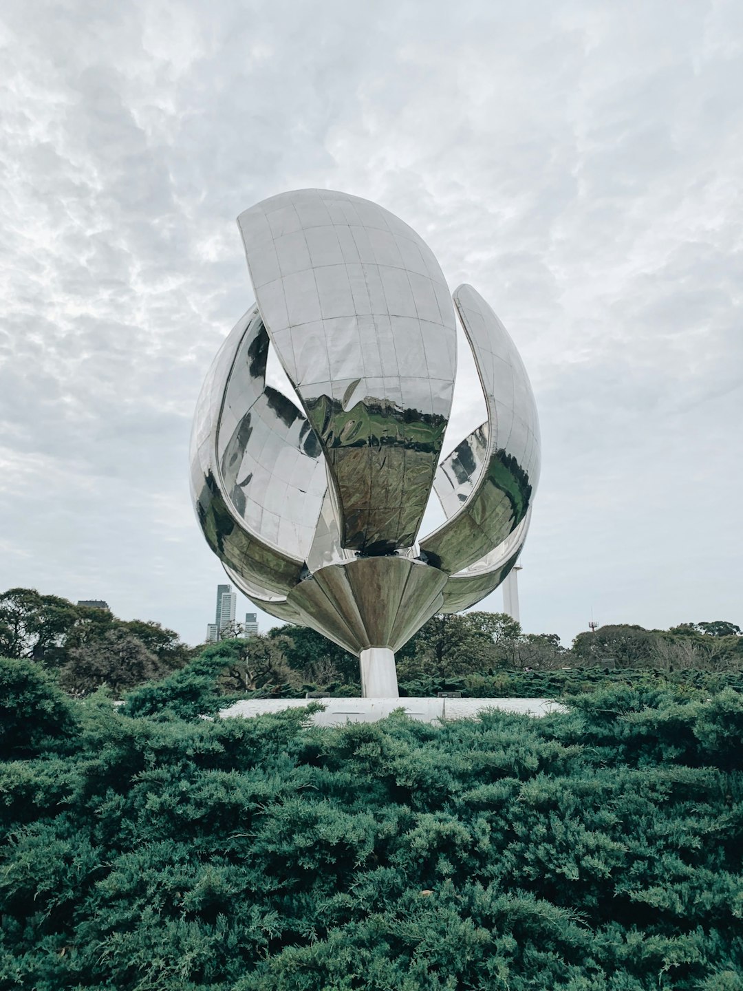 gray metal satellite surrounded with trees