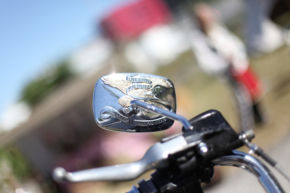 gray stainless steel motorcycle side mirror