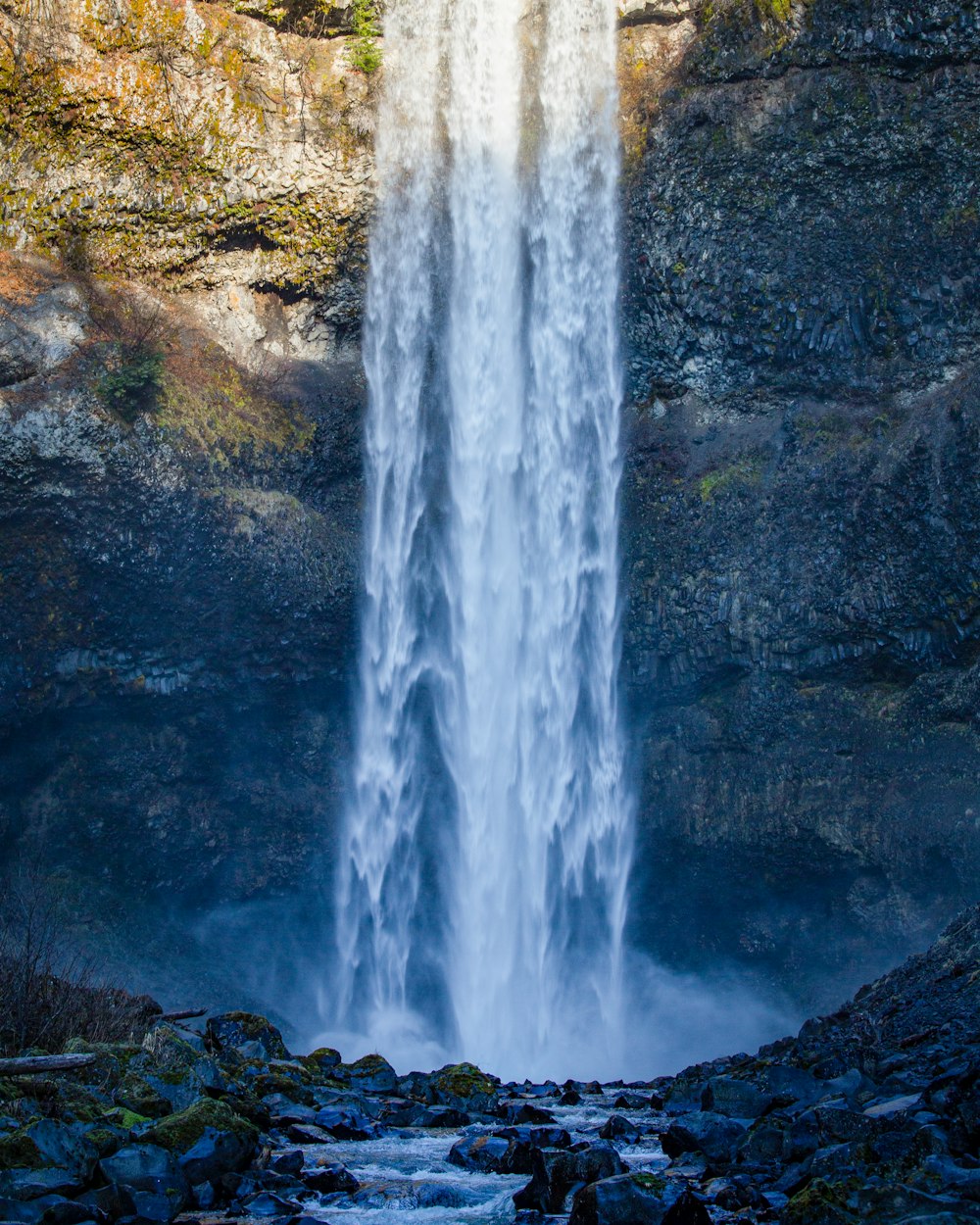 rocky mountain waterfalls during day