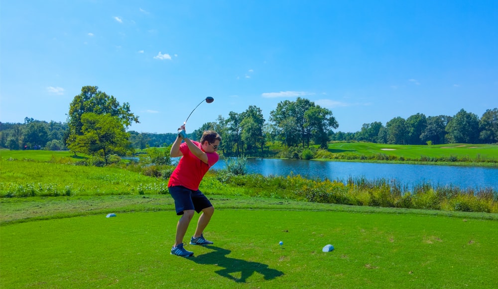 man playing golf photograph