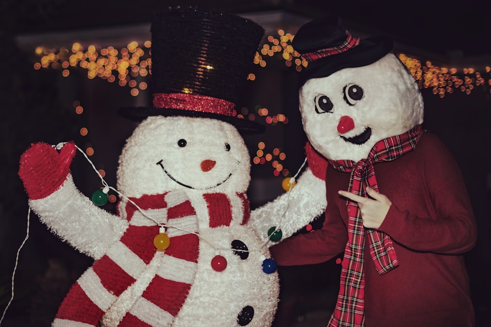 shallow focus photo of person wearing snowman costume