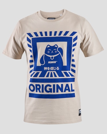 A beige T-shirt featuring a bold blue graphic of a waving cat with Japanese text beneath the design. The word 'ORIGINAL' is prominently displayed at the bottom. The overall design has a geometric border that frames the cat image.