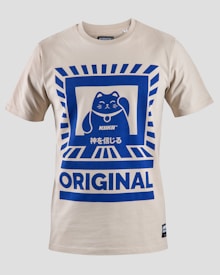 A beige T-shirt featuring a bold blue graphic of a waving cat with Japanese text beneath the design. The word 'ORIGINAL' is prominently displayed at the bottom. The overall design has a geometric border that frames the cat image.