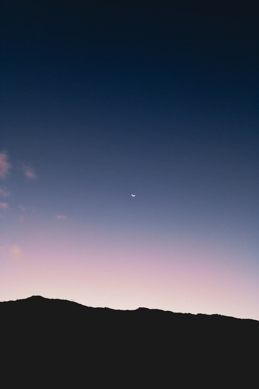 mountains and sky during night