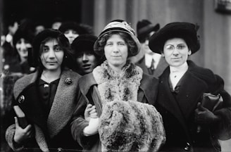 A historical photograph of women surgeons in the early 20th century.