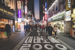 A vibrant city street scene with people wearing Lumina Apparel outfits.