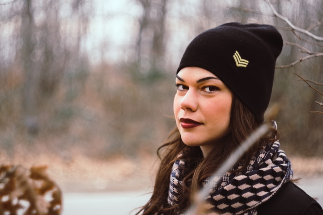 woman wearing black knit cap