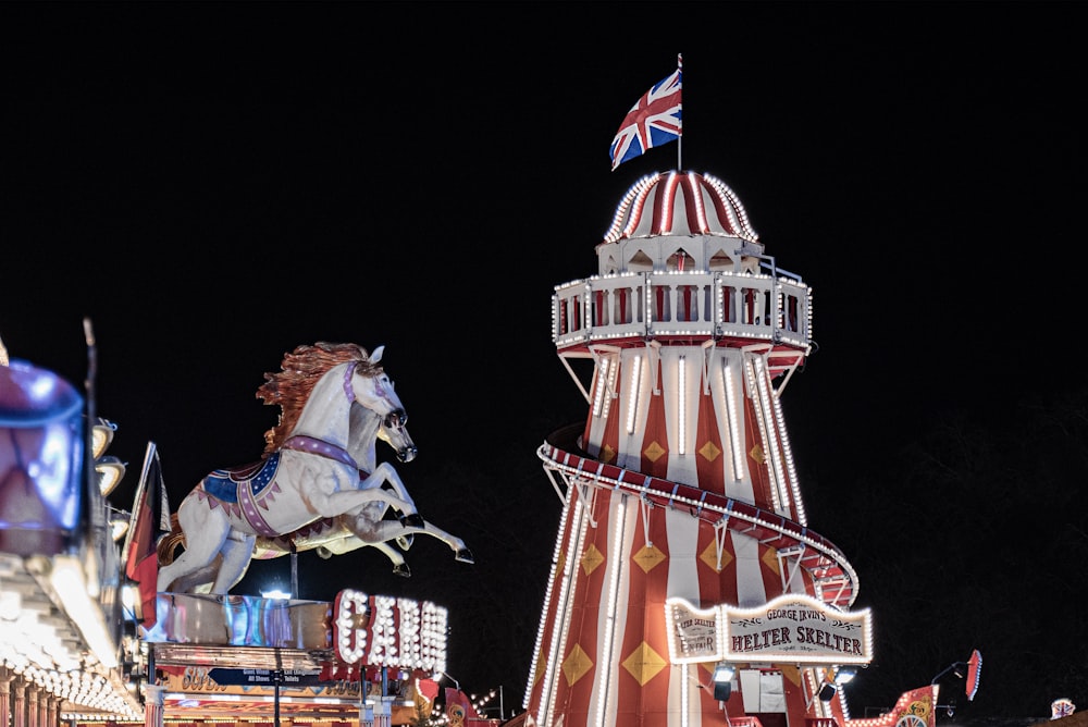 lighted tower with flag of United Kingdom