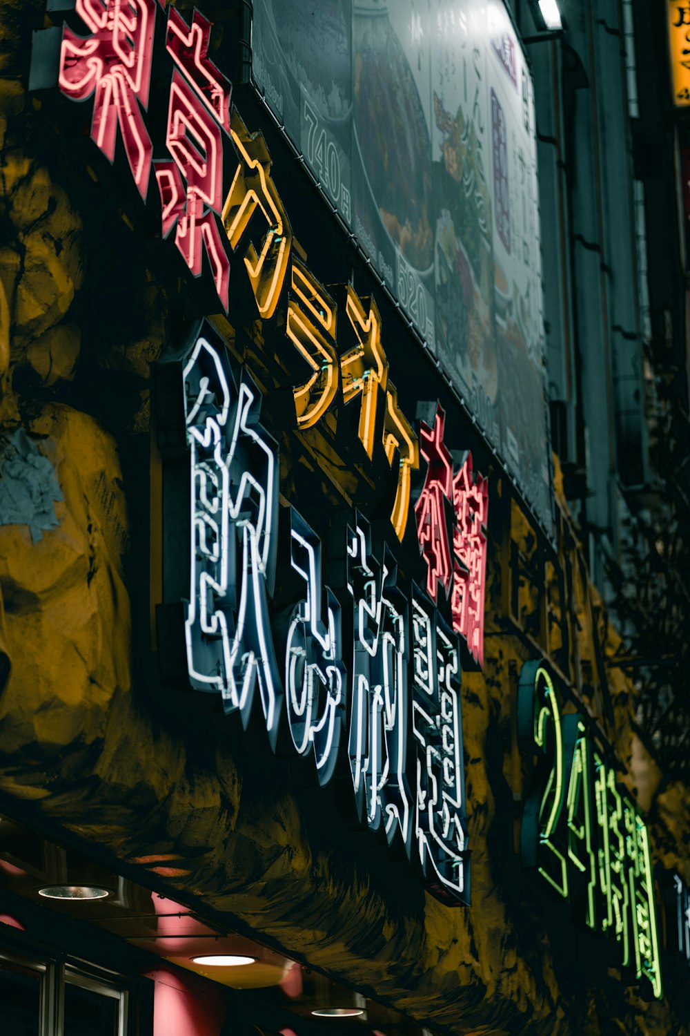 turned-on neon signs at night