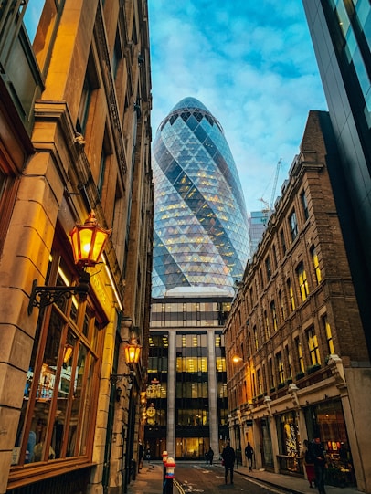 low-angle photography of a glass hotel building in the city during daytime