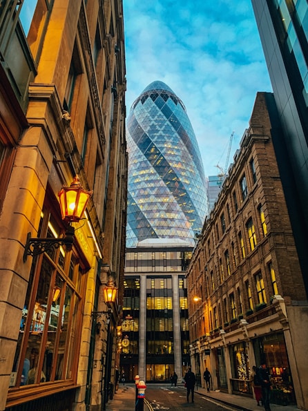 low-angle photography of a glass hotel building in the city during daytime