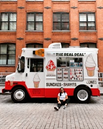 woman leaning on food truck