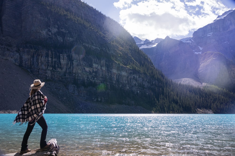 woman standing on rock